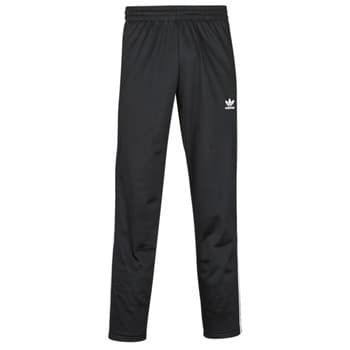 Jogging housut / Ulkoiluvaattee adidas  FIREBIRD TP  EU XS