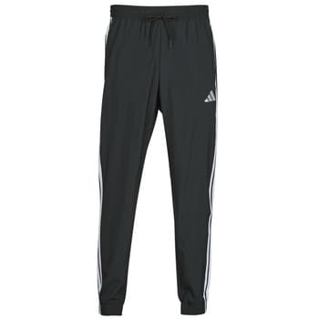 Jogging housut / Ulkoiluvaattee adidas  Essentials 3-Stripes Woven Joggers  EU M